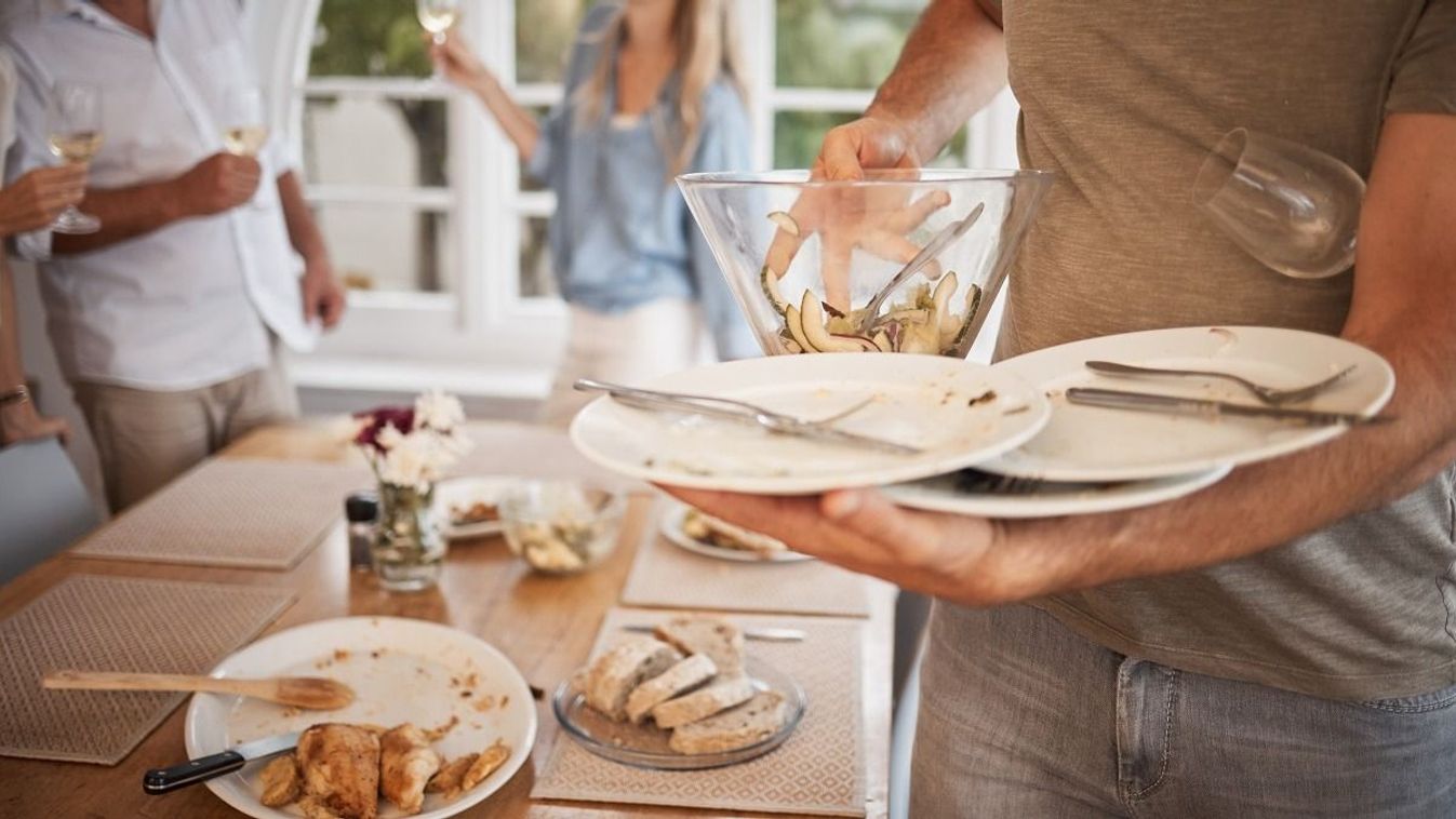 Lunch,,Family,And,Man,Cleaning,Dishes,From,Table,After,Eating