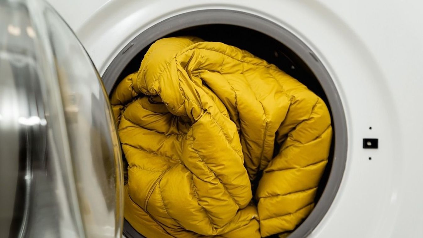 Yellow,Winter,Jacket,In,The,Drum,Of,Open,Washing,Machine