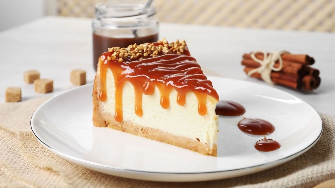 Tasty,Cheesecake,With,Caramel,And,Nuts,Served,On,Table