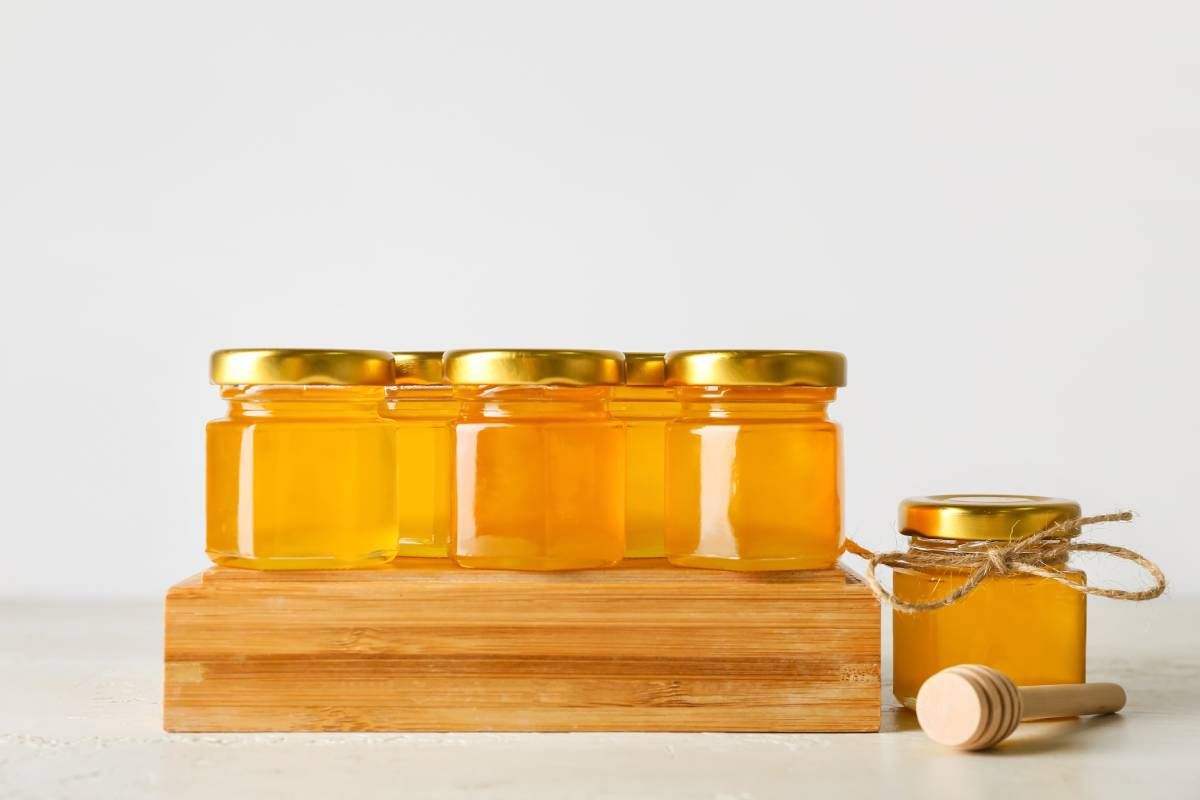 Jars,With,Honey,On,White,Background