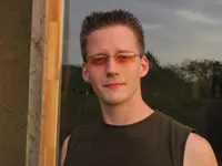 Ábrahám András szerző profilképe